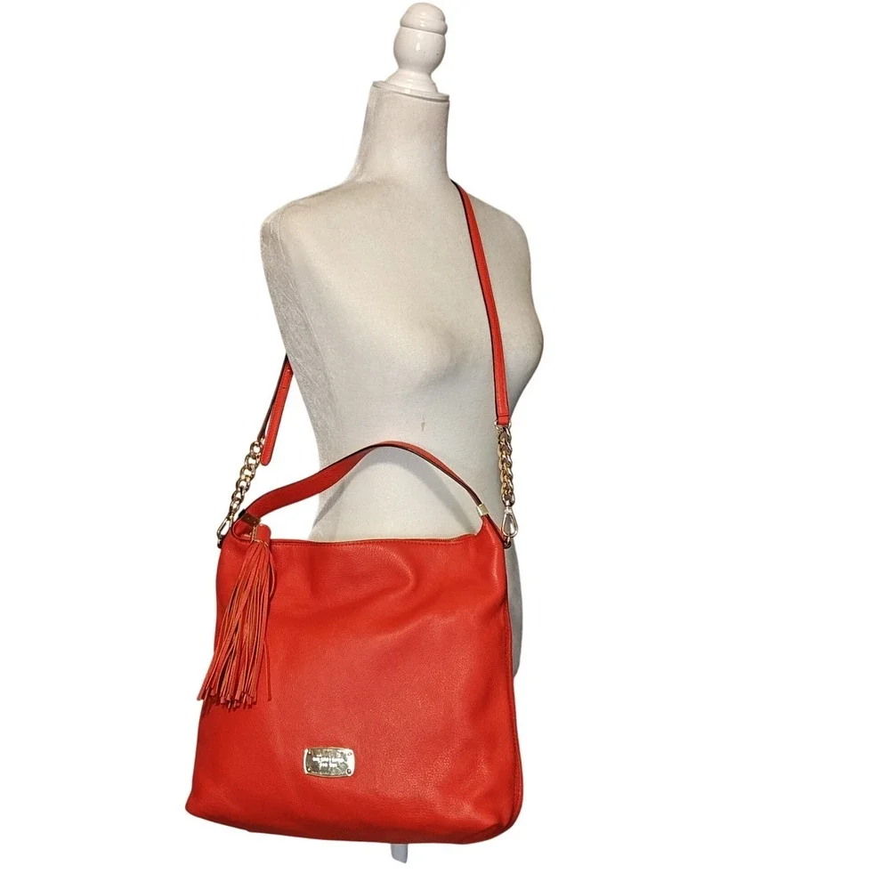 Michael Kors Hobo Crossbody Bag Womens Large Orange Pebbled Leather Tassel Gold
